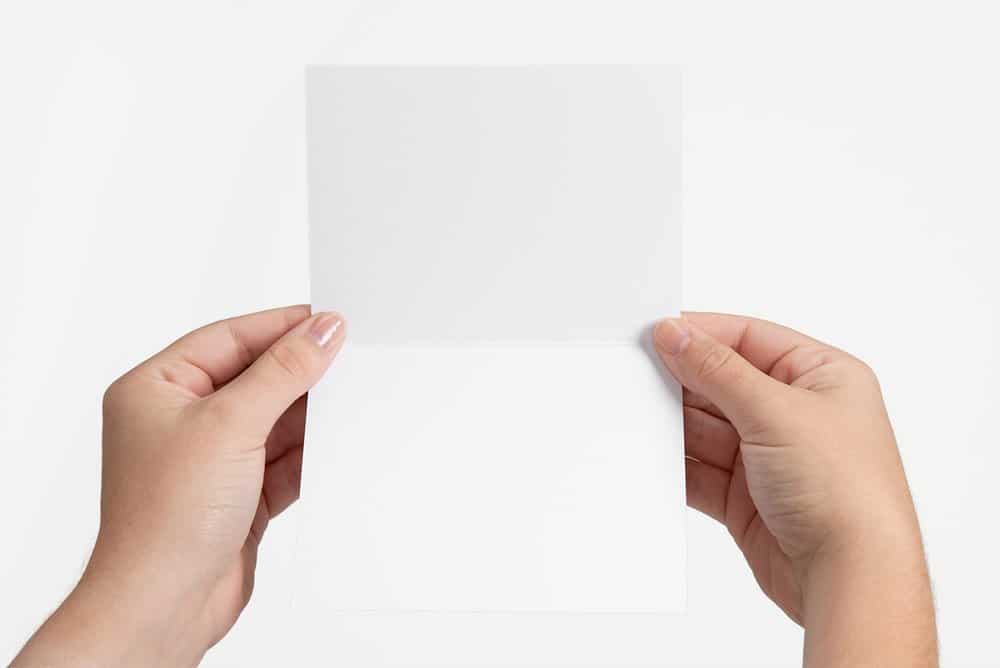 Inside of the card that is white and blank